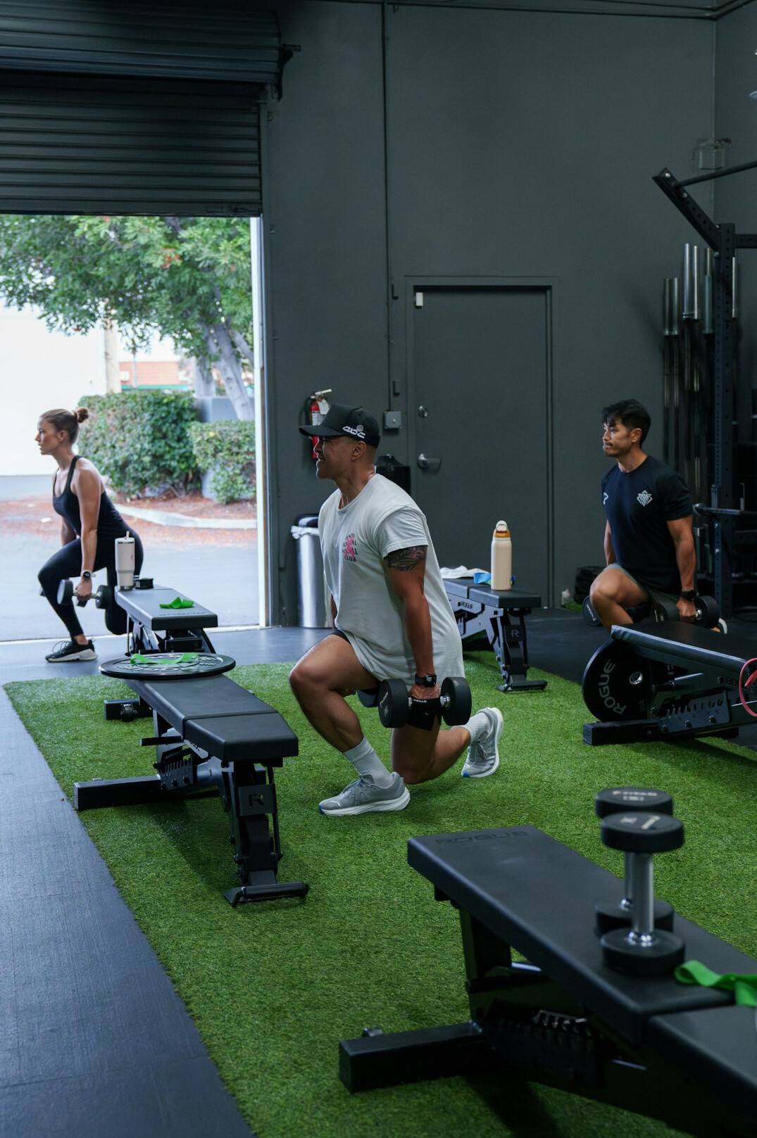 Group training session in a bright fitness studio