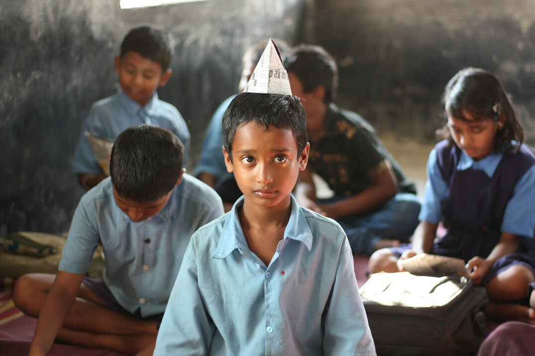 student meditating in classroom