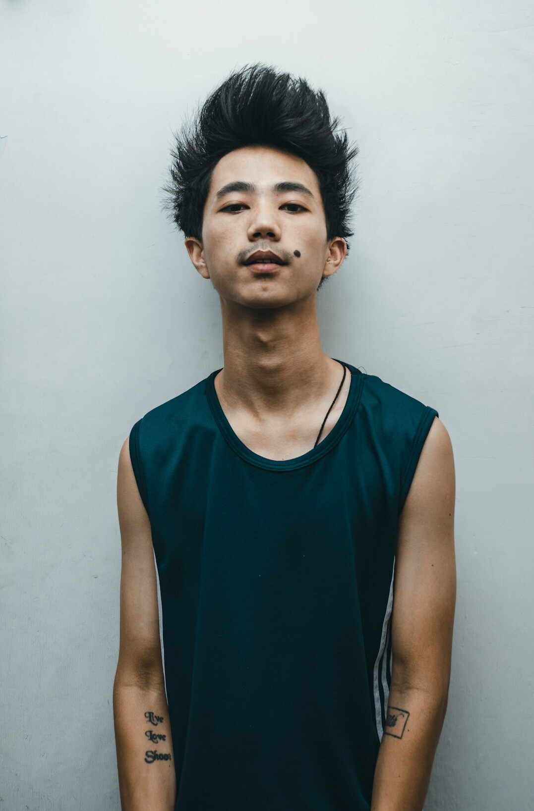 Eurasian Singaporean man sleep coach headshot