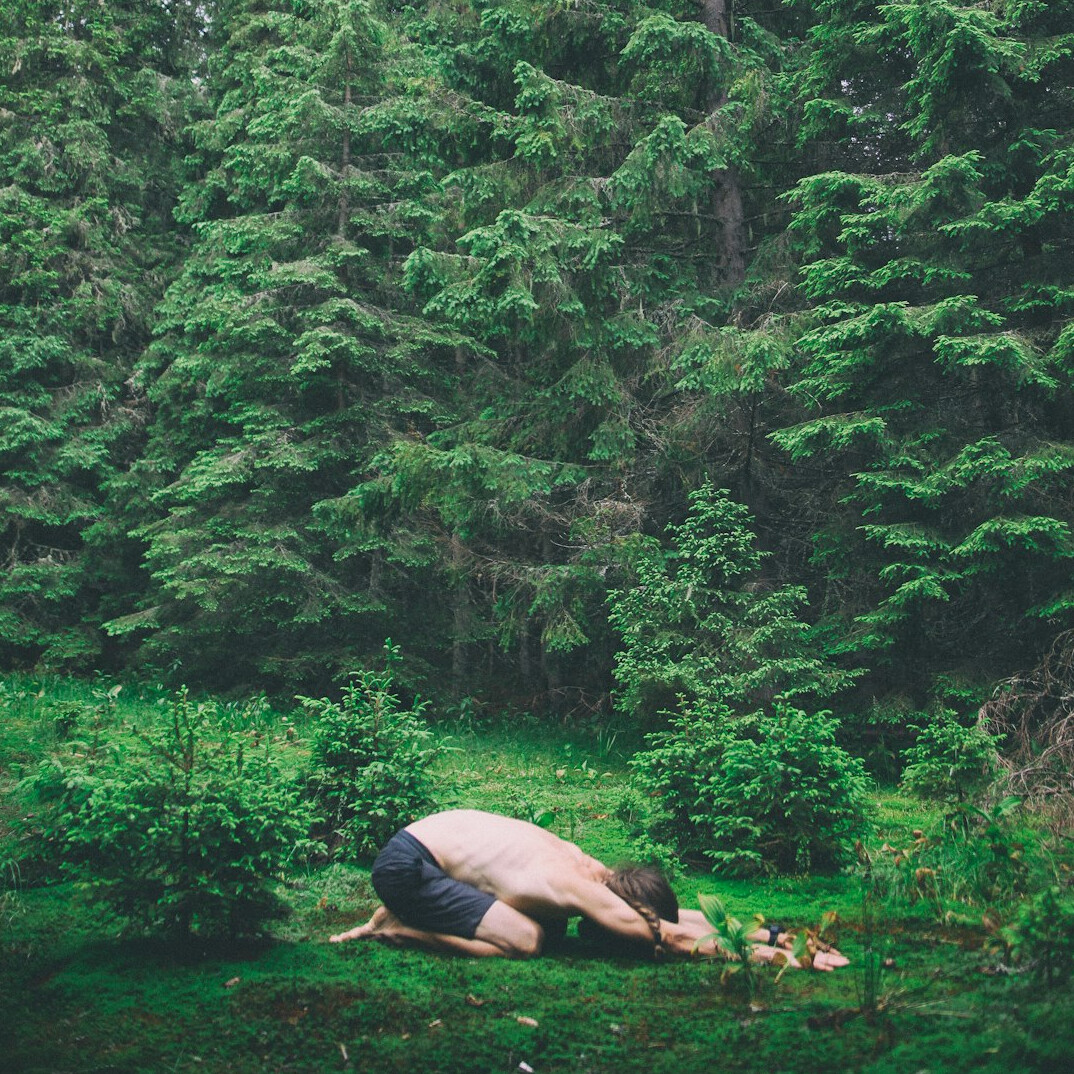 person practicing yoga outdoors