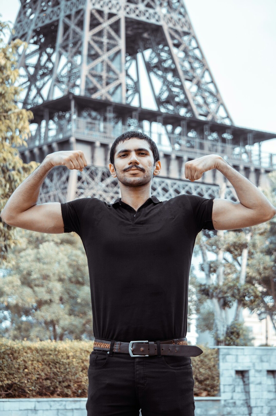 Indian Singaporean man strength coach headshot