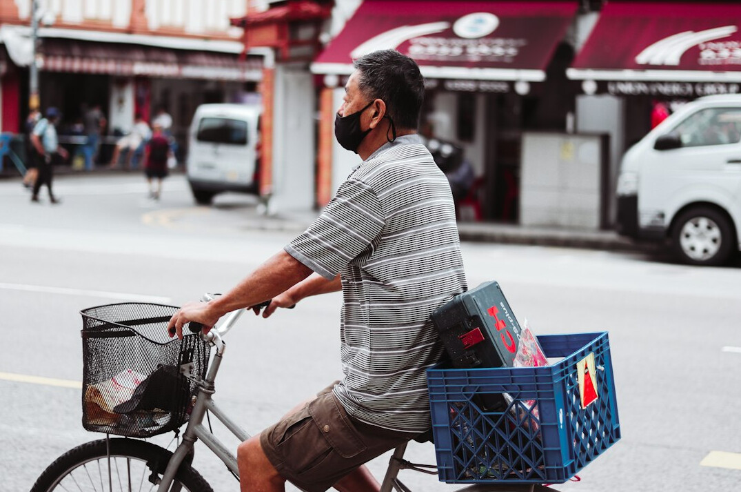 Chinese Singaporean man preventive health advisor headshot